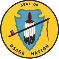 Shows Osage nation Seal - Yellow background with arrowhead pointing down with deathers and peace pipe.