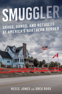 Photo of Smuggler Inn at the US-Canada border. Authors are Reece Jones and Greg Boos